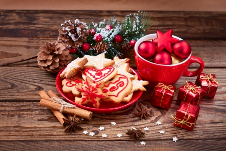 Gingerbread cookies hanging over wooden background. Christmas cardの写真素材