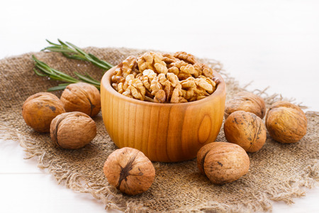 Hazelnuts, filbert on old wooden background closeupの写真素材