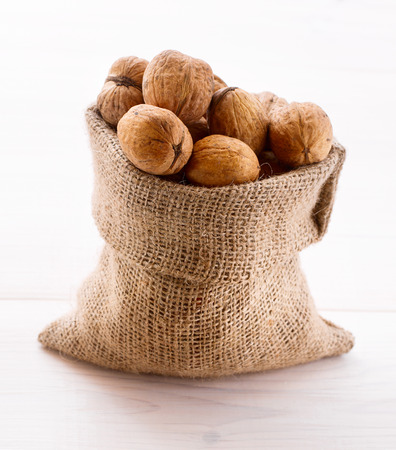 Hazelnuts, filbert on old wooden backgroundの写真素材