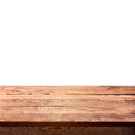Empty wooden deck table with tablecloth for product montage. Free space for your textの写真素材