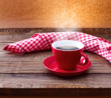 Coffee cup and saucer on wooden table. Free space for your textの写真素材