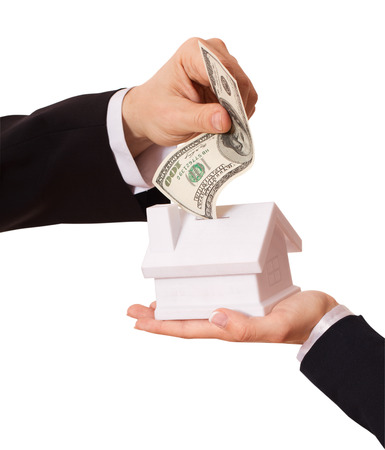 businessman giving cash dollars in  hands of passing them to the client. Concept of finance success. Isolated, space for textの写真素材