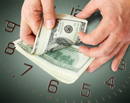 businessman giving cash dollars in  hands of passing them to the client  Concept of finance success  Isolated, space for textの写真素材