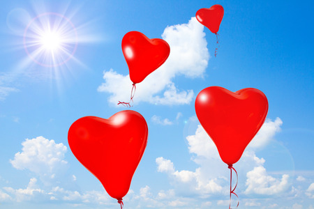 Retro love balloons on blue skyの写真素材