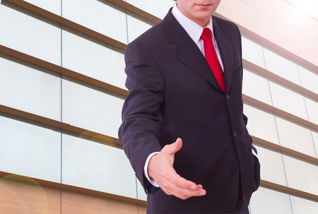 Portrait of smart business man offer handshakeの写真素材