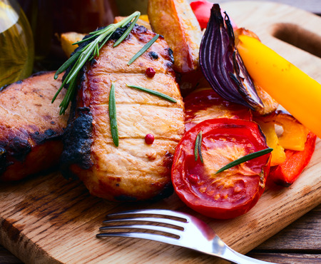Meat steak. Beef steak bbq. Tomatoes, peppers, spices for cooking meat.の写真素材