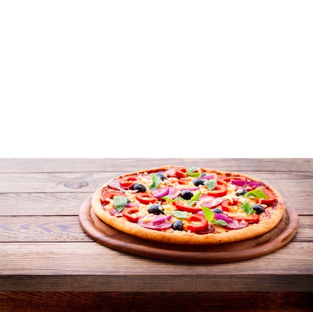 Pizza with ham, pepper and olives  Delicious fresh pizza served on wooden table  Pizza with tomato, salami and olivesの写真素材