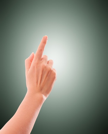 Woman hand finger presses closeup isolated  Concept, idea,の写真素材