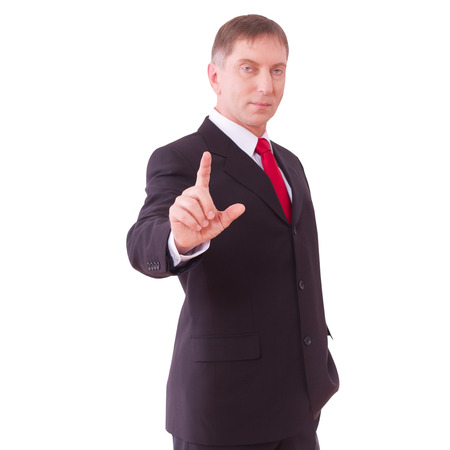 Business man with empty hand isolated. Businessman pushing on a touch screen interface. Focus on the hand of businessman の写真素材