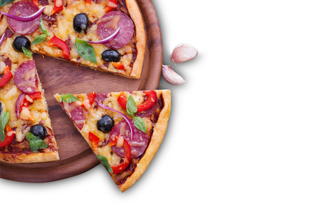 Pizza with ham, pepper and olives. Delicious fresh pizza served on wooden table.の写真素材