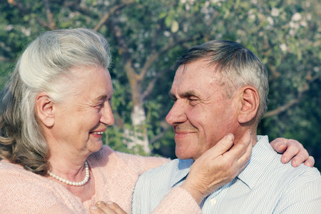 Portrait happy and smiling senior couple in love closeup. Elderly couple walking.