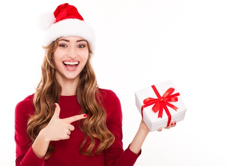 christmas woman with gift and red manicureの写真素材
