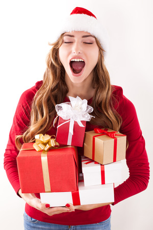 christmas woman with gift and red manicureの写真素材