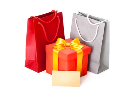 red box with  ribbon and gift card on white backgrounの写真素材