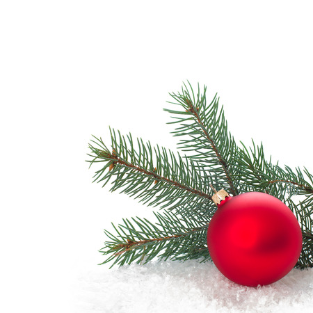Christmas ornaments on Christmas tree. Christmas border with ornament, present and snowの写真素材
