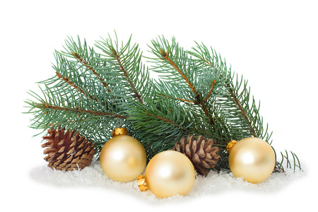 Christmas ornaments on Christmas tree. Christmas border with ornament, present and snowの写真素材