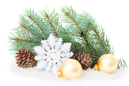 Christmas ornaments on Christmas tree. Christmas border with ornament, present and snowの写真素材