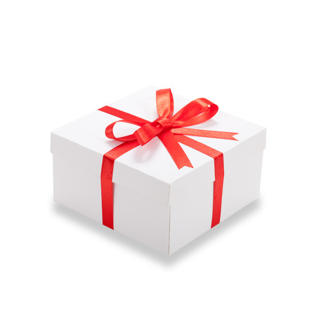 Gift box with red ribbon and bow isolated. Holiday presentの写真素材
