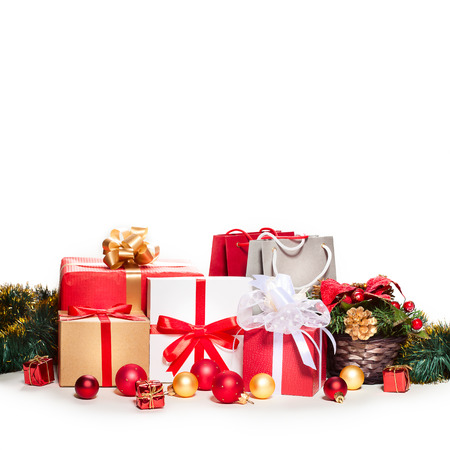 Christmas presents. Gift boxes with ribbons isolatedの写真素材