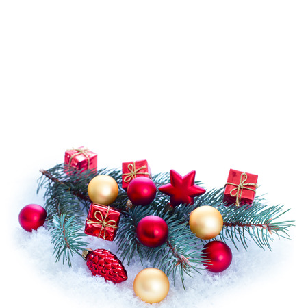 Christmas ornaments on Christmas tree. Christmas border with ornament, present and snowの写真素材