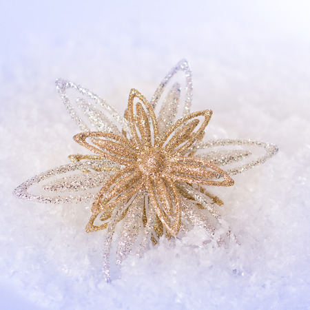 Christmas ornaments on Christmas tree. Christmas border with ornament, present and snowの写真素材