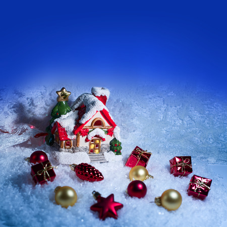 Christmas ornaments on Christmas tree. Christmas border with ornament, present and snowの写真素材