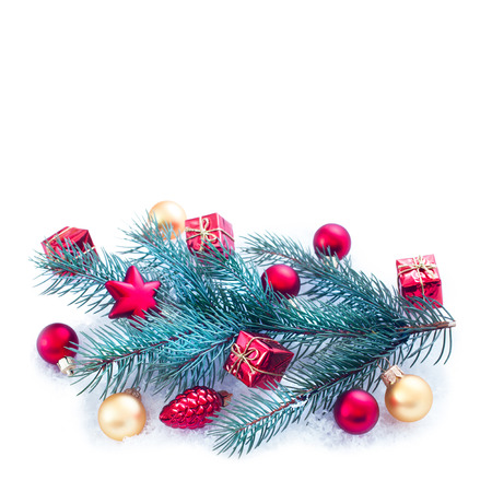 Christmas ornaments on Christmas tree. Christmas border with ornament, present and snowの写真素材