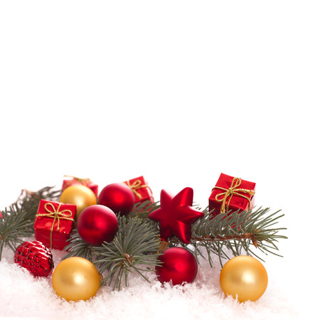 Christmas ornaments on Christmas tree. Christmas border with ornament, present and snowの写真素材