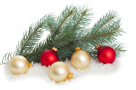 Christmas ornaments on Christmas tree. Christmas border with ornament, present and snowの写真素材