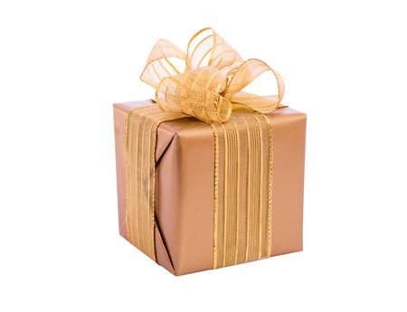 Beautiful gold gift box ribbon bow isolated. Holiday presentsの写真素材