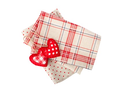 Fabric for decoration stacked and accessories for needlework isolated. Heart made of cloth.の写真素材