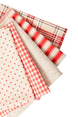 Fabric for decoration stacked and accessories for needlework isolated. Heart made of cloth.の写真素材
