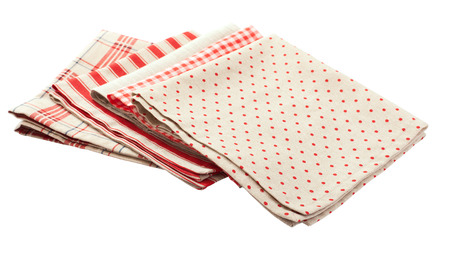 Stack of colorful dish towels isolated on whiteの写真素材