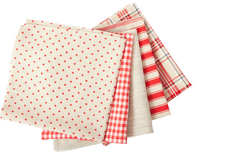 Stack of colorful dish towels isolated on whiteの写真素材