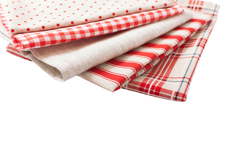 Stack of colorful dish towels isolated on whiteの写真素材