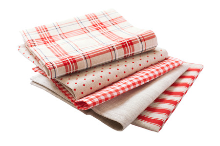 Stack of colorful dish towels isolated on whiteの写真素材