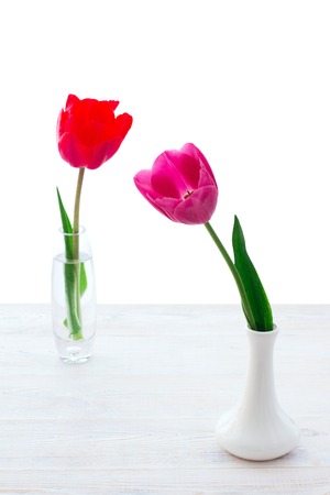 Bouquet of spring flower tulips on white wooden backgroundの写真素材