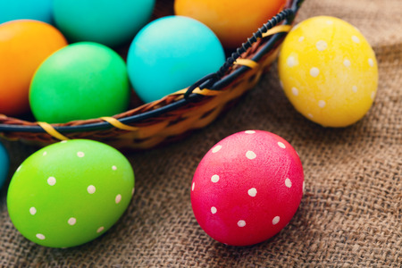 Easter eggs on wooden background. Holiday background.の写真素材