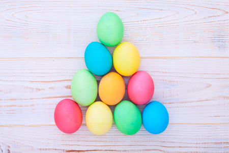 Easter eggs on wooden background. Holiday background.の写真素材
