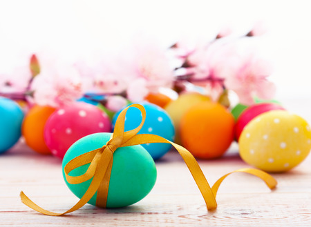 Easter eggs on wooden background. Holiday background.の写真素材