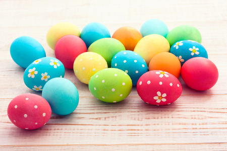 Easter eggs on wooden background. Holiday background.の写真素材