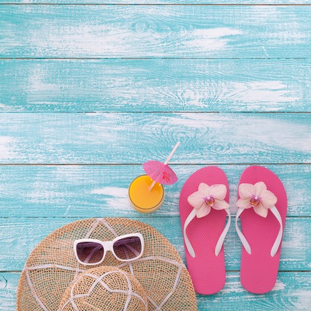 Beach on sunny day with wooden walkway and beach accessories mock up for designの写真素材