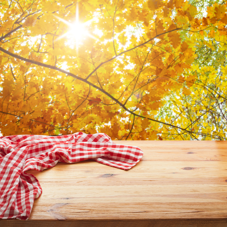 Empty table and tablecloth, Autumn background, for product display montage. Mock up for designの写真素材