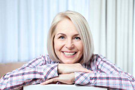 closeup portrait of elegant middle aged womanの写真素材