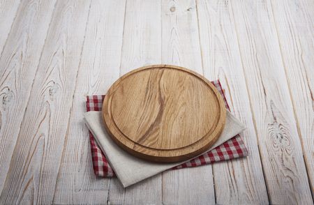 Napkin. Stack of colorful dish towels on white wooden table background top viewの写真素材