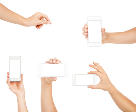 Female hand showing smartphone of white screen, front view, isolated.