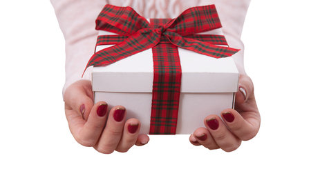 Gift box isolated. Woman holding presents.の写真素材