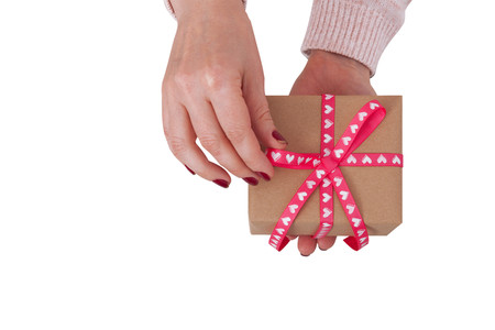 Gift box isolated. Woman holding presents.の写真素材