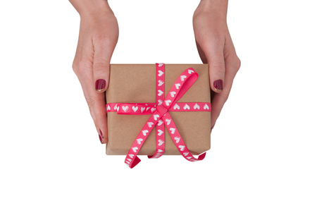 Gift box isolated. Woman holding presents.の写真素材