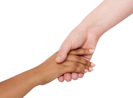 Holding hands couple of a mixed race isolated on white backgroundの写真素材